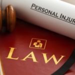 Red law book with gavel