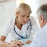 Woman giving patience diagnostic