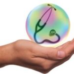 Man holding stethoscope bubble