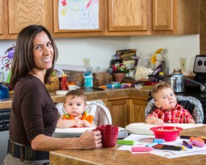 Mom feeding children