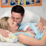 Family with newborn baby