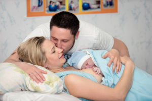 Family with newborn baby