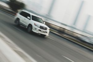 White SUV on highway