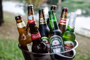 Different beers in a bucket