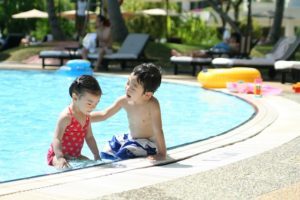 Children playing in swimming pool