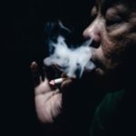Older man smoking