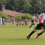 Kids playing soccer