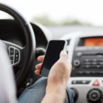 Man texting and driving