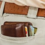 Man with wallet in back pocket