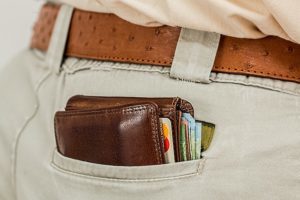 Man with wallet in back pocket