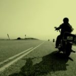 Motorcyclist driving on highway