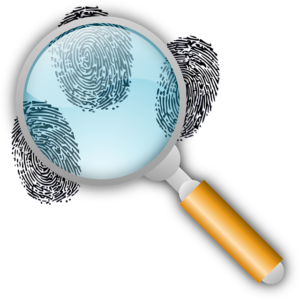 Magnifying glass and fingerprints