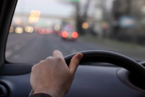 Man driving in the evening