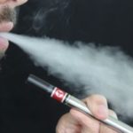 Man smoking e-cigarette