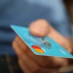 Person using credit card