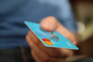 Person using credit card