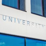 University sign on building