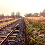 Train tracks in field