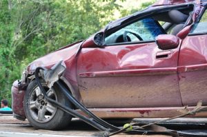 a crashed car, auto accident attorney