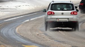 driving on winter road, car accident lawyer