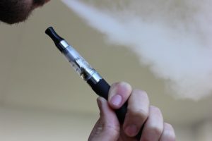 A man smoking e-cigarette