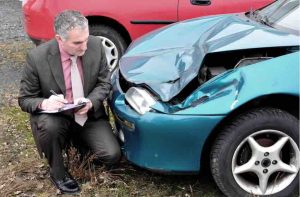 Businessman is documenting a car accident