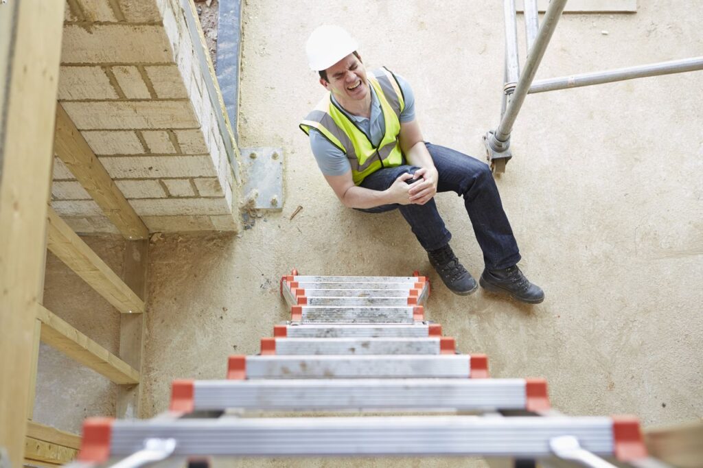 construction worker falling off a ladder